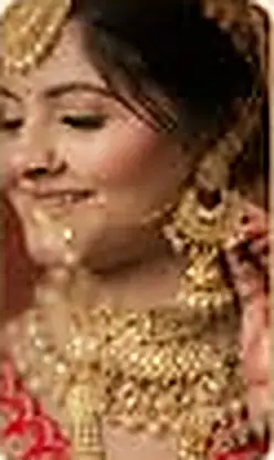 A wedding procession under a white mirror-work canopy, guests in red and gold, cropped tightly from a small flyer inset.